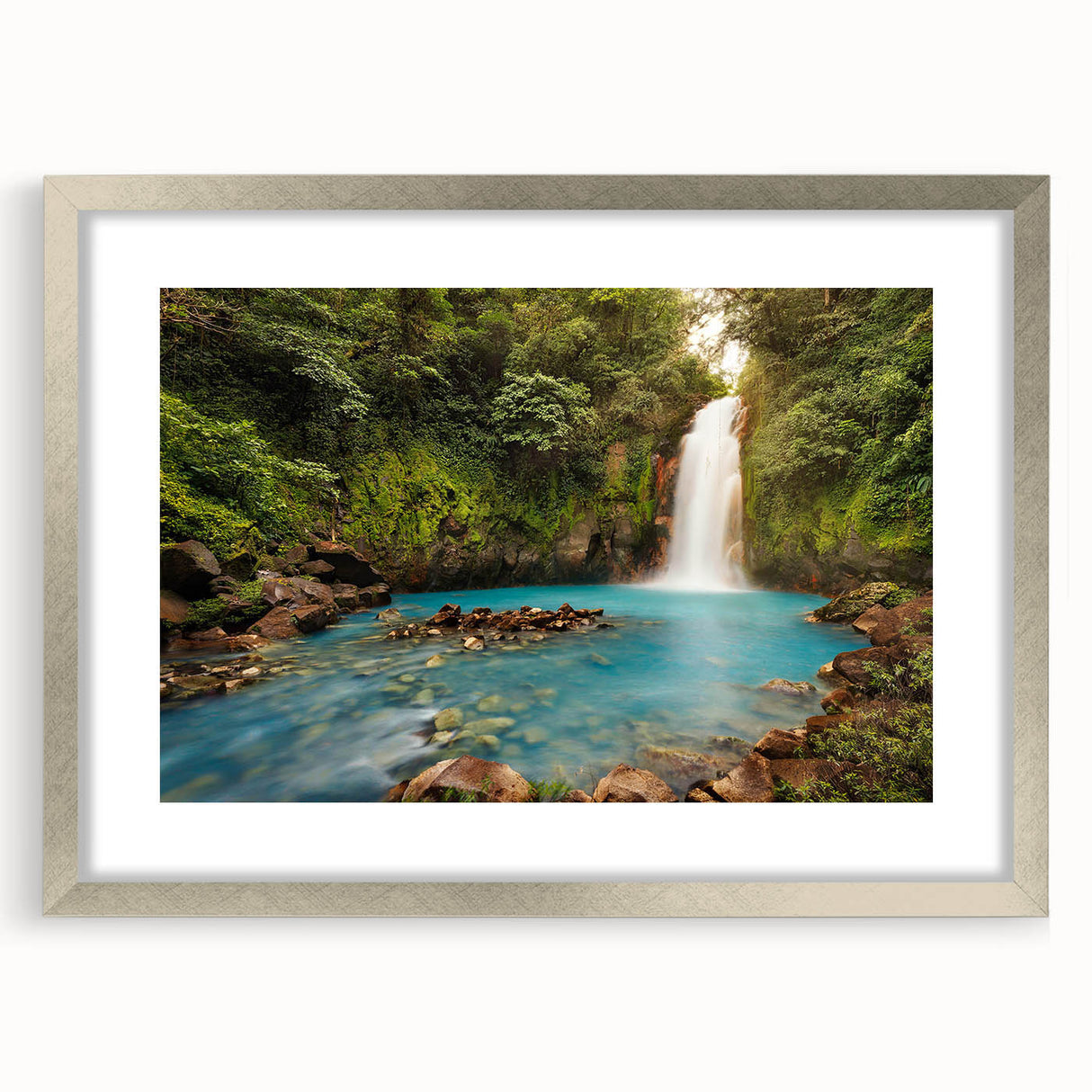 Framed rainforest landscape wall art collection in silver finish with matting, showcasing vibrant green foliage and serene natural scenery, perfect for home decor.