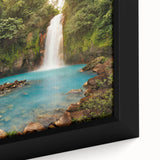 Framed canvas artwork showcasing a vibrant rainforest landscape design, featuring lush greenery and intricate details, perfect for enhancing home decor and nature-themed interiors.