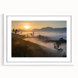 Framed rainforest landscape wall art featuring vibrant green foliage and detailed textures, set in a sleek white mat, perfect for enhancing home decor.