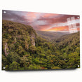 Acrylic glass wall art showcasing a vibrant rainforest landscape design, elegantly displayed from a side view with visible mounting pins, perfect for enhancing home decor.