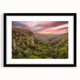 Framed wall art collection featuring a vibrant rainforest landscape design, with a sleek black frame and mat, ideal for enhancing home decor and adding a touch of nature.