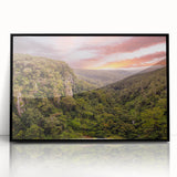 Framed acrylic wall art showcasing a vibrant rainforest landscape design with lush green foliage and tropical elements, perfect for home decor enhancement.