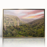 Framed acrylic wall art showcasing a vibrant rainforest design with gold accents, perfect for adding a touch of nature-inspired elegance to modern home decor.