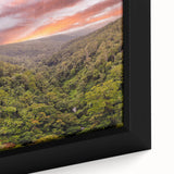 Close-up of a framed canvas showcasing a vibrant rainforest landscape design, featuring lush green foliage and intricate details, perfect for nature-themed decor.