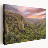 Stretched canvas wall art showcasing a lush rainforest landscape design, featuring vibrant green foliage and intricate details, ideal for nature-themed decor.