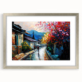 Framed wall art featuring a serene landscape with winding roads, set in a silver frame with a white mat, perfect for modern home decor.