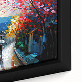 Close-up of a framed canvas wall art piece depicting a serene landscape with winding roads and vibrant colors, perfect for home decor or office inspiration.