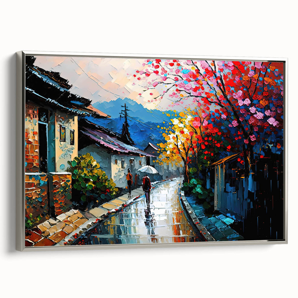 Framed canvas wall art showcasing a serene landscape with winding roads and vibrant greenery, accented by a sleek silver frame, perfect for modern home decor.