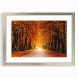 Framed wall art featuring a serene landscape design with a silver mat, showcasing a winding road through lush greenery, perfect for enhancing home decor.