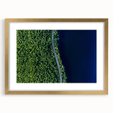 Framed wall art featuring a stunning landscape road design with a gold mat, perfect for enhancing home decor and adding a touch of elegance to any room.
