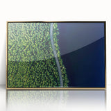 Framed acrylic wall art featuring a modern landscape design with gold accents, showcasing a serene road through lush greenery, perfect for home decor.