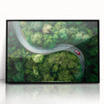 Framed acrylic wall art showcasing a stunning landscape with winding roads, featuring a sleek black frame, perfect for modern home decor or office settings.