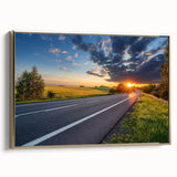 Framed canvas wall art featuring a scenic landscape with winding roads, set against a gold frame that adds elegance to modern home decor. Perfect for living rooms or offices.