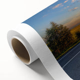 Rolled canvas wall art featuring a serene landscape with winding roads, vibrant colors, and intricate details, perfect for enhancing home decor and aesthetics.