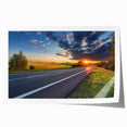 Rolled print showcasing a serene landscape road design, featuring vibrant colors and intricate details, ideal for home decor or office art collection.