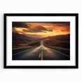 Framed wall art collection showcasing a scenic landscape with winding roads, featuring a sleek black frame and matting, ideal for modern home decor.