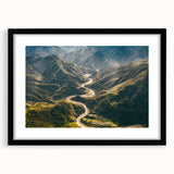 Framed wall art featuring a scenic landscape road design, presented in a sleek black frame with a white mat, perfect for enhancing modern home decor.