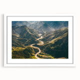 Framed wall art print showcasing a serene landscape road design in soft colors, elegantly displayed with a white mat, perfect for home decor enhancement.