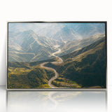 Framed acrylic wall art showcasing a serene landscape with winding roads, highlighted by silver accents and a contemporary design, perfect for modern home decor.