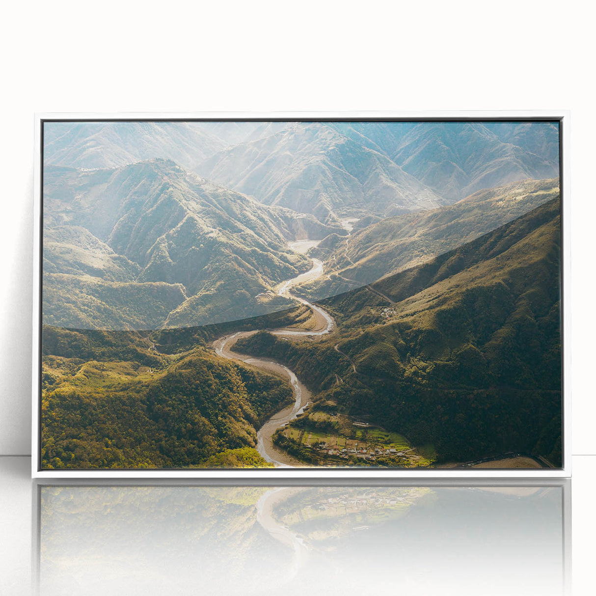 Framed acrylic wall art featuring a modern landscape design with vibrant colors, showcasing a serene road scene, presented in a sleek white frame for contemporary decor.