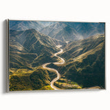 Framed canvas wall art showcasing a serene landscape road design in muted tones, featuring a silver frame and textured finish, perfect for home decor.