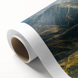 Rolled canvas artwork showcasing a serene landscape with winding roads, vibrant colors, and intricate details, perfect for enhancing home decor aesthetics.