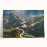 Stretched canvas wall art showcasing a vibrant landscape with winding roads and scenic views, perfect for home decor. Ideal for nature enthusiasts and art lovers.
