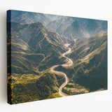 Stretched canvas wall art showcasing a serene landscape with winding roads, vibrant greens, and soft blue skies, perfect for modern home decor.