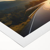 Rolled canvas artwork showcasing a vibrant landscape road design, featuring rich colors and intricate details, ideal for home décor or art enthusiasts.