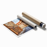 Rolled print showcasing a vibrant landscape road design, featuring rich colors and intricate details, ideal for home decor and artistic spaces, securely packaged in a protective tube.