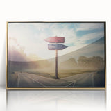 Framed wall art featuring a stunning landscape with winding roads and vibrant colors, showcased in an elegant gold frame, perfect for home decor enhancement.