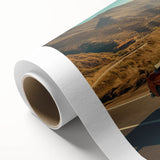 Rolled canvas artwork depicting a serene landscape road design, showcasing vibrant colors and intricate details, ideal for home decor or art enthusiasts.