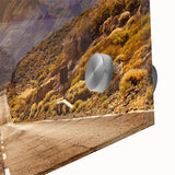 Close-up of a vibrant acrylic glass wall art piece showcasing a scenic landscape with winding roads, perfect for enhancing modern home decor.