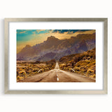 Silver-framed wall art featuring a serene landscape and winding road design, elegantly matted for a polished look, ideal for home decor enhancement.