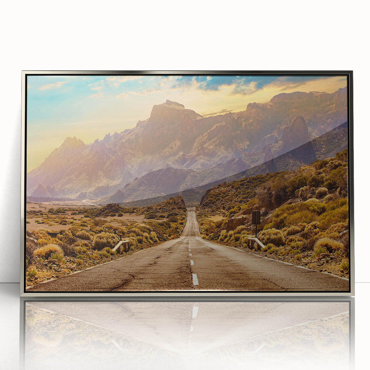 Framed acrylic wall art showcasing a stunning landscape road design with silver accents, perfect for modern home decor. Ideal for enhancing interior spaces.
