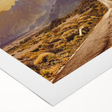 Rolled canvas artwork showcasing a vibrant landscape scene with winding roads and lush greenery, designed for home decor, elegantly packaged in a protective tube.