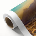 Rolled canvas artwork showcasing a vibrant landscape design with winding roads and lush greenery, perfect for home decor or office spaces, delivered in a protective tube.