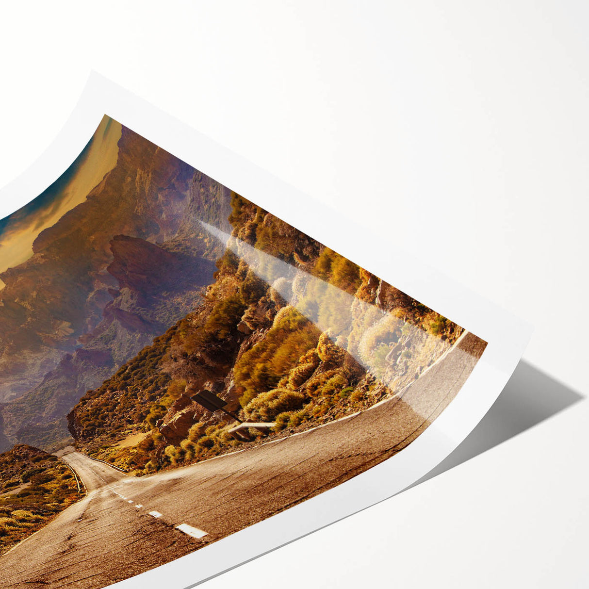 Abstract landscape wall art print showcasing a tranquil road surrounded by lush greenery and vibrant blue skies, rolled and ready for display in any modern home decor.
