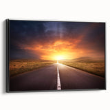 Framed canvas wall art featuring a serene landscape with winding roads and lush greenery, presented in a sleek black frame, ideal for home decor.