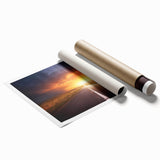 Rolled print of a landscape road design showcasing vibrant colors and intricate details, perfect for home decor, packaged securely in a cardboard tube for delivery.