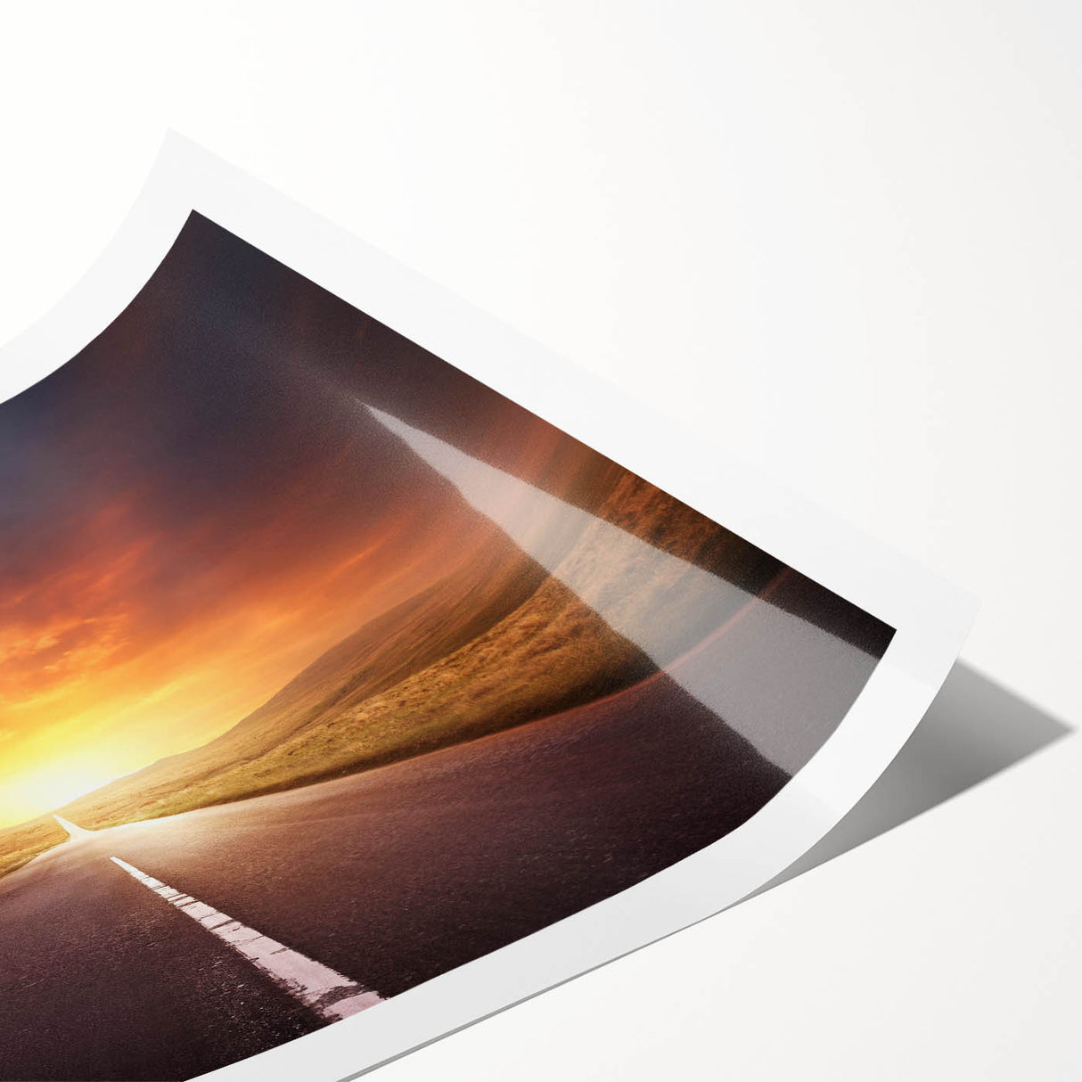 Rolled print of a serene landscape road scene, showcasing vibrant colors and intricate details, perfect for home decor or office art collection.