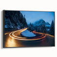 Framed canvas wall art showcasing a scenic landscape with winding roads, featuring a black frame that enhances the design's depth and visual appeal. Ideal for modern home decor.
