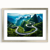Framed wall art showcasing a serene landscape with winding roads, presented in a sleek silver frame with a white mat, ideal for home decor.