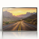 Framed wall art featuring a stunning landscape design with winding roads, displayed in an elegant silver frame, perfect for enhancing home decor.