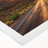Rolled canvas artwork showcasing a serene landscape road design with vibrant colors, ideal for home decor, presented in a protective cardboard tube.