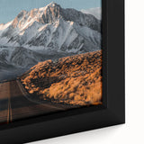 Framed canvas wall art showcasing a vibrant landscape design featuring winding roads and lush greenery, perfect for home decor. The close-up highlights intricate details and textures, enhancing any interior space.