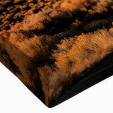 Close-up of a stretched canvas artwork showcasing a vibrant landscape road design, featuring rich colors and intricate details, perfect for home decor.