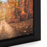 Framed canvas wall art showcasing an abstract landscape with winding roads and vibrant colors. The close-up highlights texture and detail, perfect for modern decor.