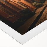 Colorful rolled canvas artwork showcasing abstract landscape and road designs, perfect for home decor, presented in protective packaging for safe delivery.