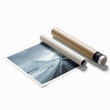 Rolled print of a serene landscape featuring winding roads, vibrant greenery, and a clear blue sky, elegantly designed for wall art display, ideal for home decor.